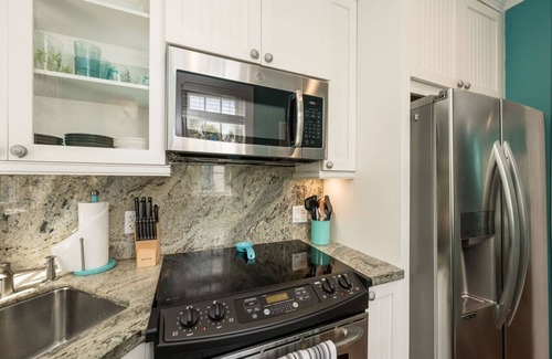 Historic Seaport Condo | Rooftop Renaissance - Upscale Condo in Old Town Key West. Perfect for Couples.