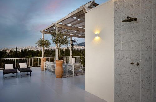 Mousio Apartment | Rooftops of Athens - Areos Studio Jacuzzi & View