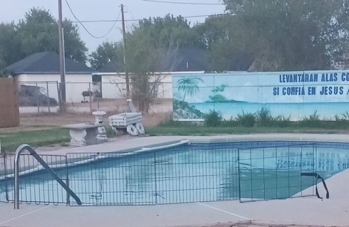 Donna House | Room available. Relax in the pool after a long hard, hot day; bring the family.