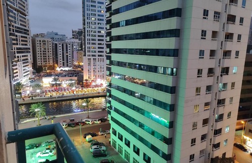 Al Majaz House | Room for Rent in a Family Apartment- Waterfront View