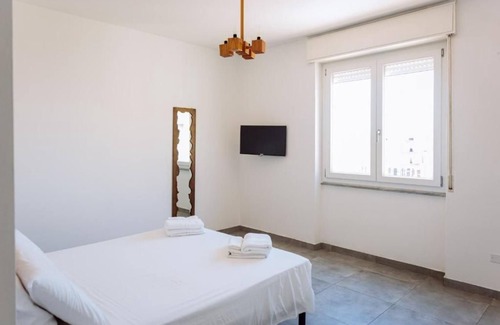 Porto Torres Apartment | Room Olivo - Full service room with private bathroom