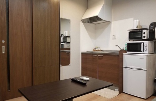 Nakagyo Ward Apartment | Room on the first floor with a separate Japanesestyle room kitchen and 4 Japanesestyle futons/Kyoto Kyōto