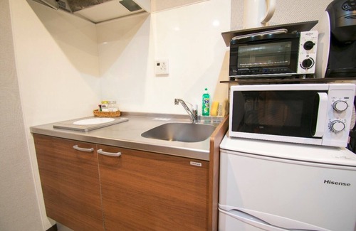 Nakagyo Ward Apartment | Room on the first floor with a separate Japanesestyle room kitchen and 4 Japanesestyle futons/Kyoto Kyōto