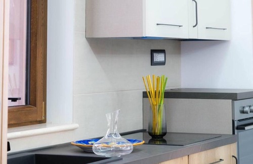 Mazzarino Apartment | Room 'Stanza Del Vino' with Shared Terrace, Wi-Fi and Air Conditioning