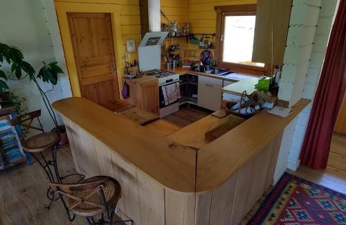 Rimont House | Room with en suite bathroom in cosy wooden house