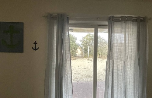 Cottage Line Apartment | Roomy Beachfront Apartment, Deck, Game Room! by RedAwning