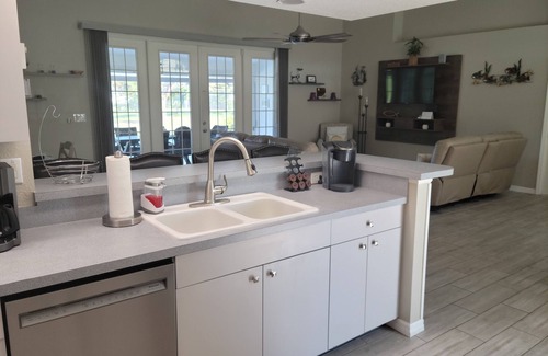 White Marsh House | Rotonda West 3 bed/3 bath Home with serene Lake View from your private pool deck