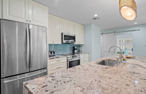 Kings Lake House | Rovigo Vacation Rental: Spacious Retreat with Panoramic Lake Views in Kings Lake. 4-BR, 4-Bathroom Home with Private Pool and just 3.4 Miles from the Vibrant 5th Ave and Naples Attractions!