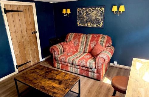 Crowborough House | Rustic 18th century stone cottage with fireplace and parking