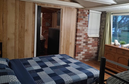 St. Williams House | Rustic 2 bedroom home with indoor fireplace.