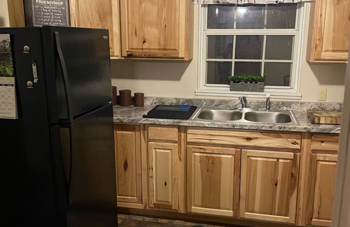 Oak Hill Cabin | Rustic Cabin minutes from New River Gorge National Park and downtown Oak Hill.