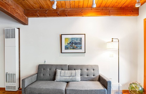 Marrowstone Cabin | Rustic cabin with wraparound deck and wood stove in a tranquil location