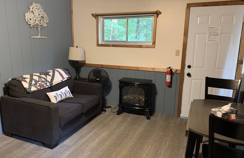 Palmyra Cabin | Rustic cabins in secluded campground with lake access and woods to wander in.