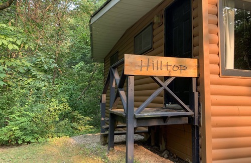 Palmyra Cabin | Rustic cabins in secluded campground with lake access and woods to wander in.