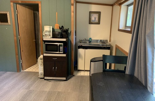 Sand Creek Cabin | Rustic cabins in secluded campground with lake access and woods to wander in.