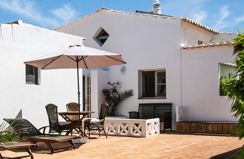 Lagos Cottage | Rustic Family Room with Mezzanine and Large Sun Terrace