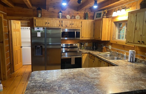 Logan Cabin | Rustic Getaway Cabin equipped with Hot Tub, trails on property, private!