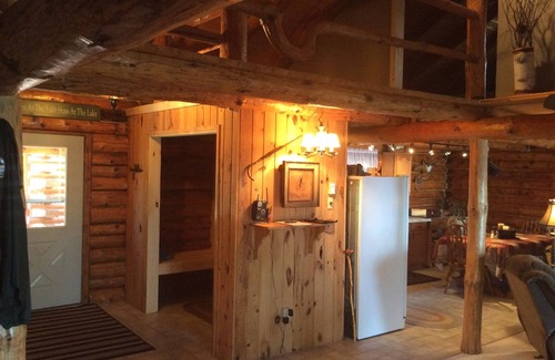 Grand Marais Cabin | Rustic log cabin with large loft 3 total bedrooms rustic log railings