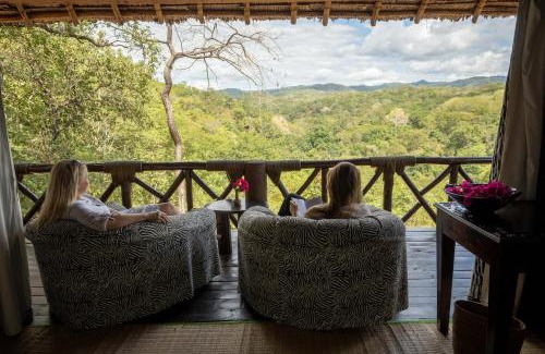 Selous Game Reserve Cabin | Sable Mountain Lodge, A Tent with a View Safaris