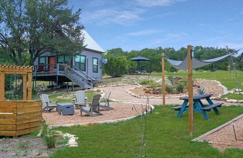 Dripping Springs Cabin | Safari Treehouse w/Fire Pit, Grill & Seasonal Creek Views in Dripping Springs