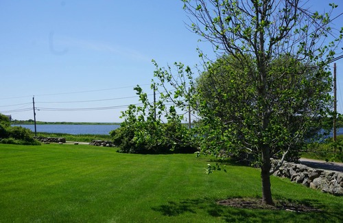 Little Compton House | Sakonnet Point water view cottage with 8 minute walk to idyllic private beach .