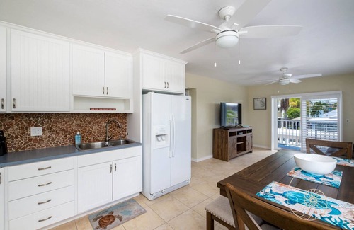 Long Key House | Sand 'N Sea ~ 3 Bedroom Canal Front Home w/Pool in Layton