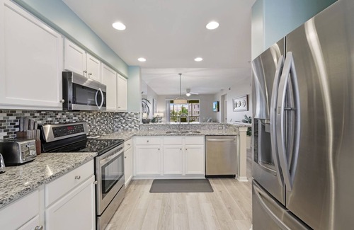 Tropical Cove Condo | Sandcastle Retreat at Lexington CC Lake Village