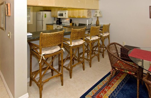 Cocoa Beach Condo | Sandcastles 113 is just steps to the pool and the beach
