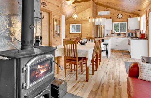 Amherst House | Sandy beach with spa and fire pit