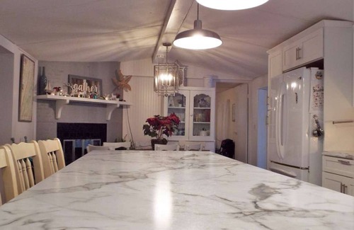 Hesston House | Sandy's Lake Chateau - Beautifully updated home on 3 private acres.