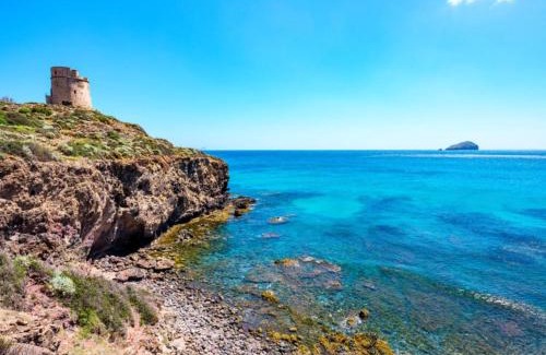 Sant'Antioco House | Sant Antioco Yellow Apartment with 2 Way Air Con