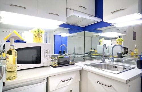 Mousio Hotel | Santorini Style in Athens, Greece