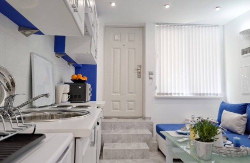 Mousio Hotel | Santorini Style in Athens, Greece