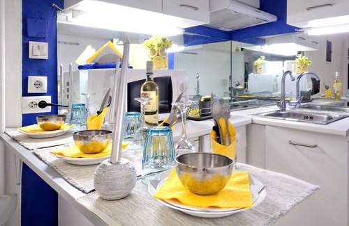 Mousio Hotel | Santorini Style in Athens, Greece