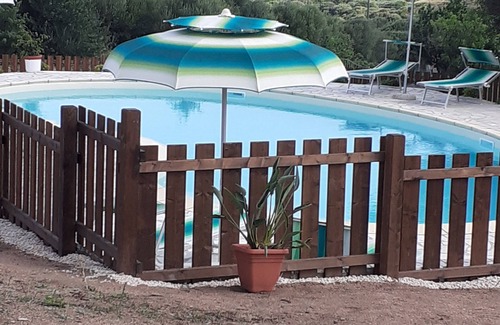Aglientu Apartment | Sea breeze apartment with swimming pool and sea view, air conditioning,