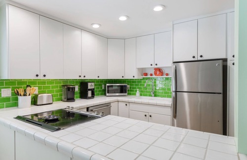 Key West Historic District Apartment | SEA CONCH~ Amazing location with shared pool, deck, and parking!