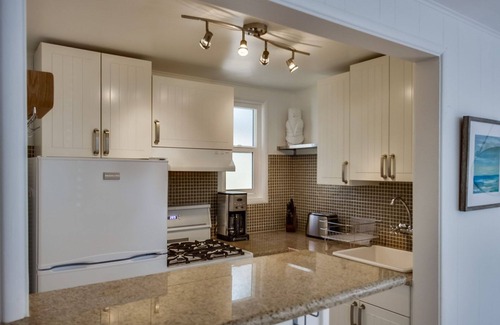 Beach Barber Tract Apartment | Sea Glass Hideaway, Designer Studio, Dog Friendly, Private Patio and Parking!