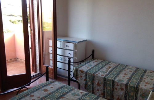 Aglientu House | Sea view cottage two bedrooms two bathrooms living room kitchen large outdoor spaces