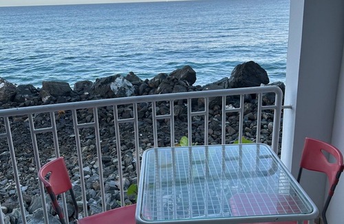 Stella Condo | Seafront Sanctuary: Oceanfront Living 30 Feet from the Water at Going Coastal