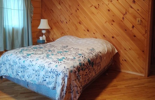 Finlayson Cabin | Secluded 3 bedroom Log Lodge Home w/trails & Private Lake and Pond