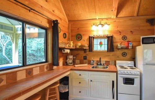 Brenham Cabin | Secluded and Cozy Romantic Cabin with Hot Tub at Scenic Hill Retreat