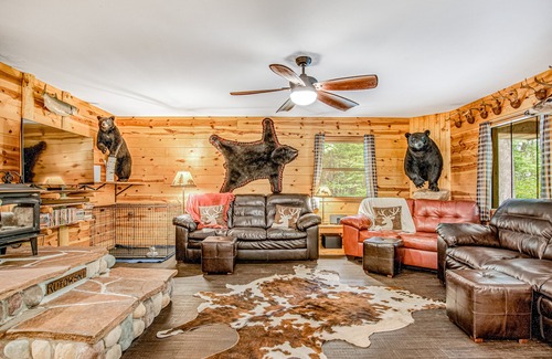 Lac du Flambeau House | Secluded dog-friendly home with dock, woodstove, porch, firepit, kayaks, & bikes