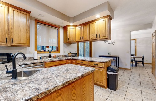 New Lisbon House | Secluded exclusive brick home with game room, fireplaces, large porch, firepit