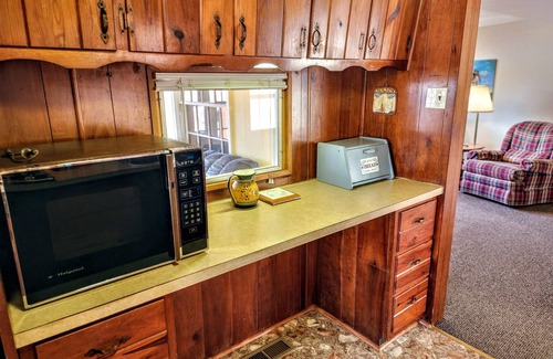Stover House | Secluded Lake of the Ozarks Vacation Home Waterfront with a Covered Dock.