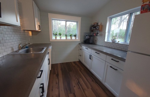Barryton Cottage | Secluded Riverfront Cottage on the Chippewa with all the Modern Amenities
