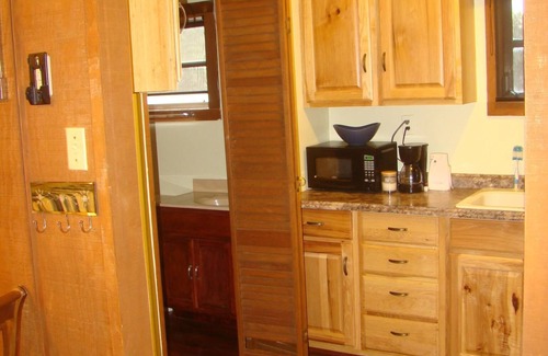 Leakey Cabin | Secluded, shady river front Get-away cabin