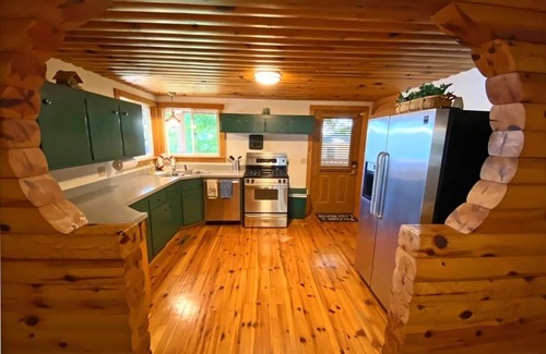 Burr Oak Cabin | Secluded SW Michigan Lake View Log Cabin w/Fire Pit & Deck on Long Lake