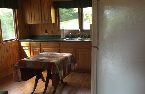 Saranac Lake House | Secluded Waterfront Log Home with Amazing Mountain Views on Otter Slide