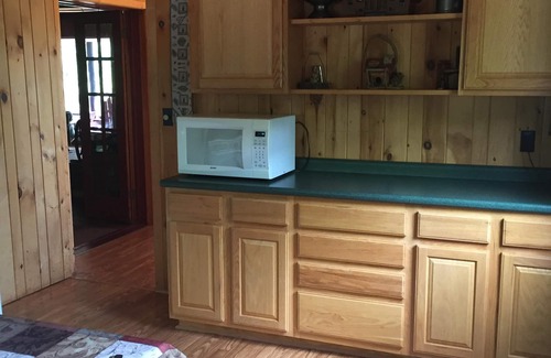 Saranac Lake House | Secluded Waterfront Log Home with Amazing Mountain Views on Otter Slide