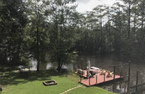 Freeport House | Secluded Waterfront with deep water dock, trailer parking, and public boat ramp